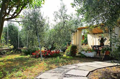 Casa Olmo: A welcoming apartment surrounded by the Tuscan countryside, a few miles from the sea, with Free WI-FI.