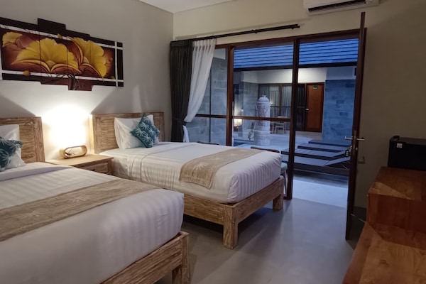 Deluxe Twin Room, Balcony, Pool View | In-room safe, desk, blackout drapes, free WiFi