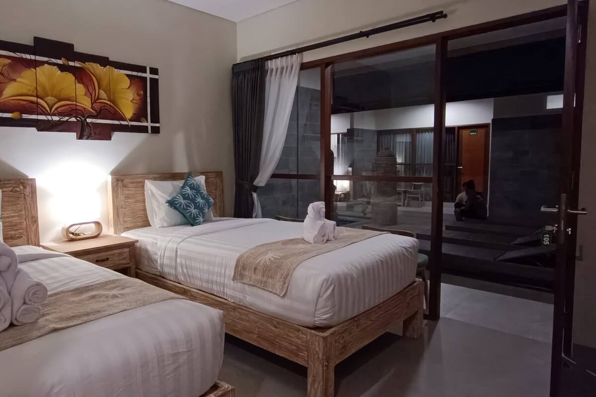 Deluxe Twin Room, Balcony, Pool View | In-room safe, desk, blackout curtains, soundproofing