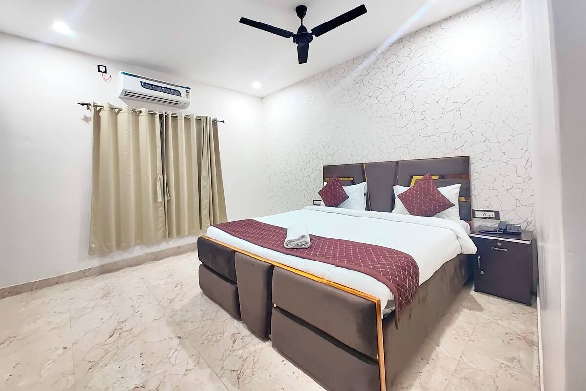 Deluxe-Doppelzimmer, Mehrere Schlafzimmer, Stadtblick | Kostenloses WLAN, Bettwäsche