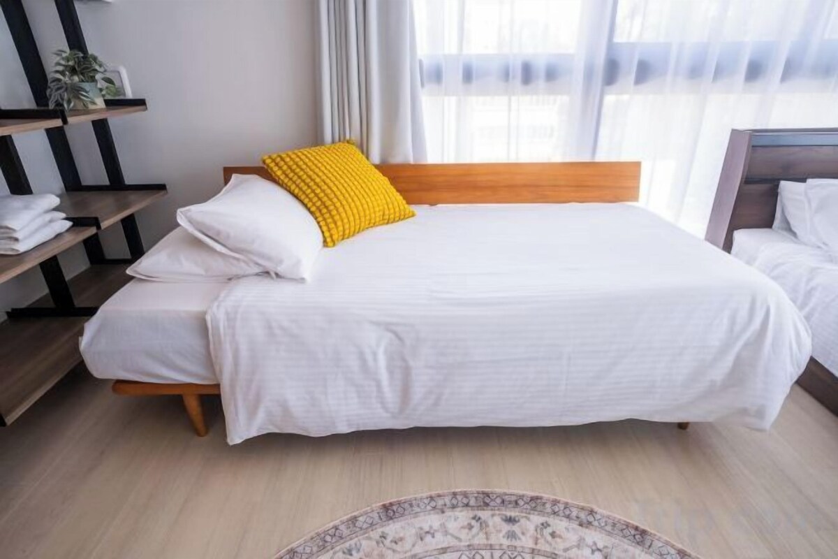1 bedroom, blackout drapes, soundproofing, iron/ironing board