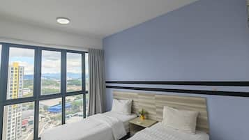 Deluxe Apartment, 3 Bedrooms, Balcony, City View | 3 bedrooms, desk, laptop workspace, iron/ironing board