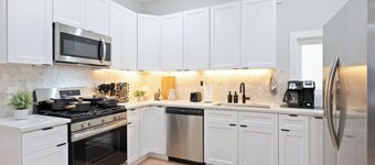 Modern Urban Retreat 4BR Home, Game Room, Yard, Quick PATH & NYC Bus Access