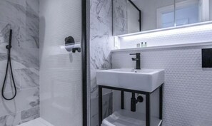 Hair dryer, towels, soap, toilet paper