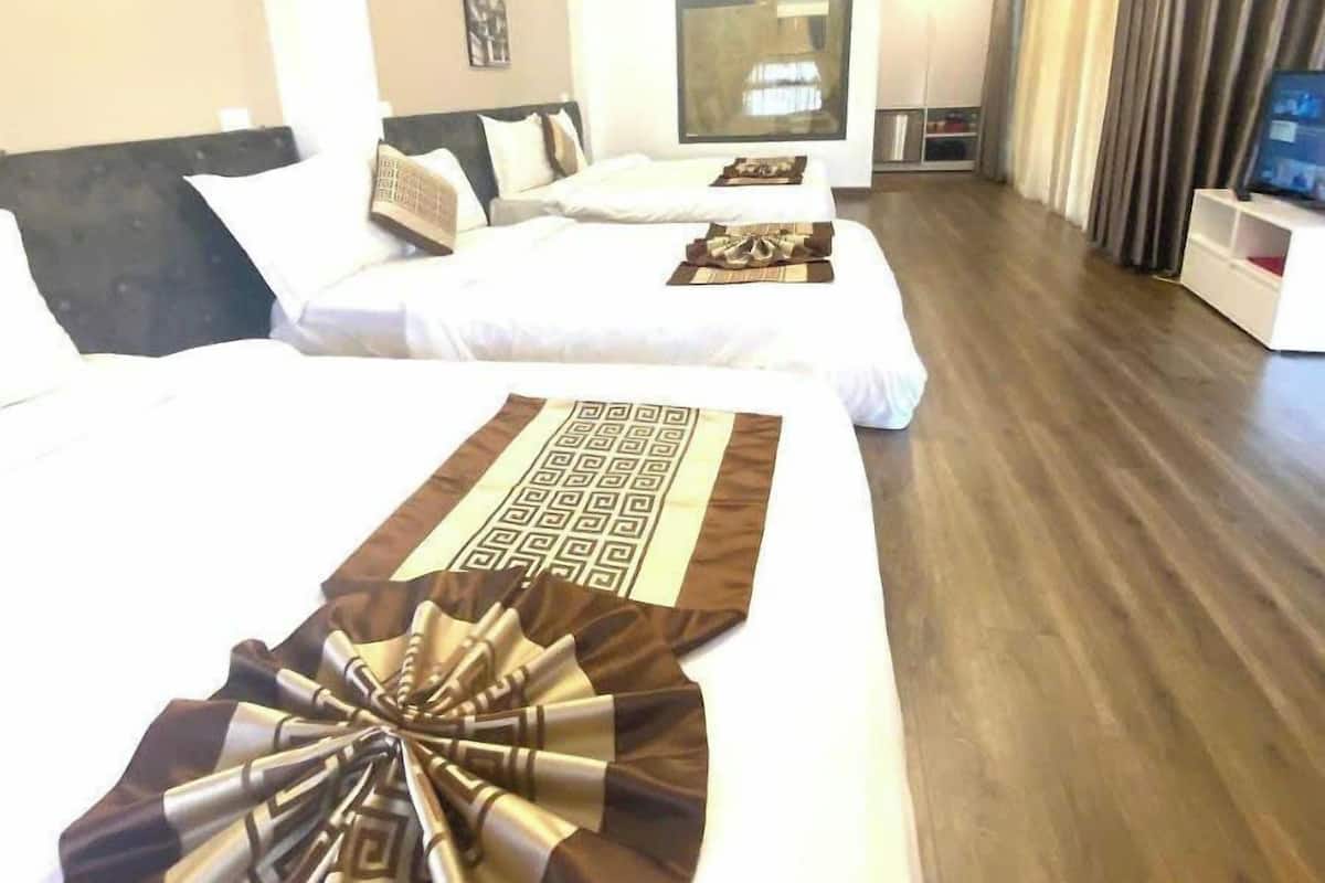 Family Triple Room, Hill View | Living area | TV
