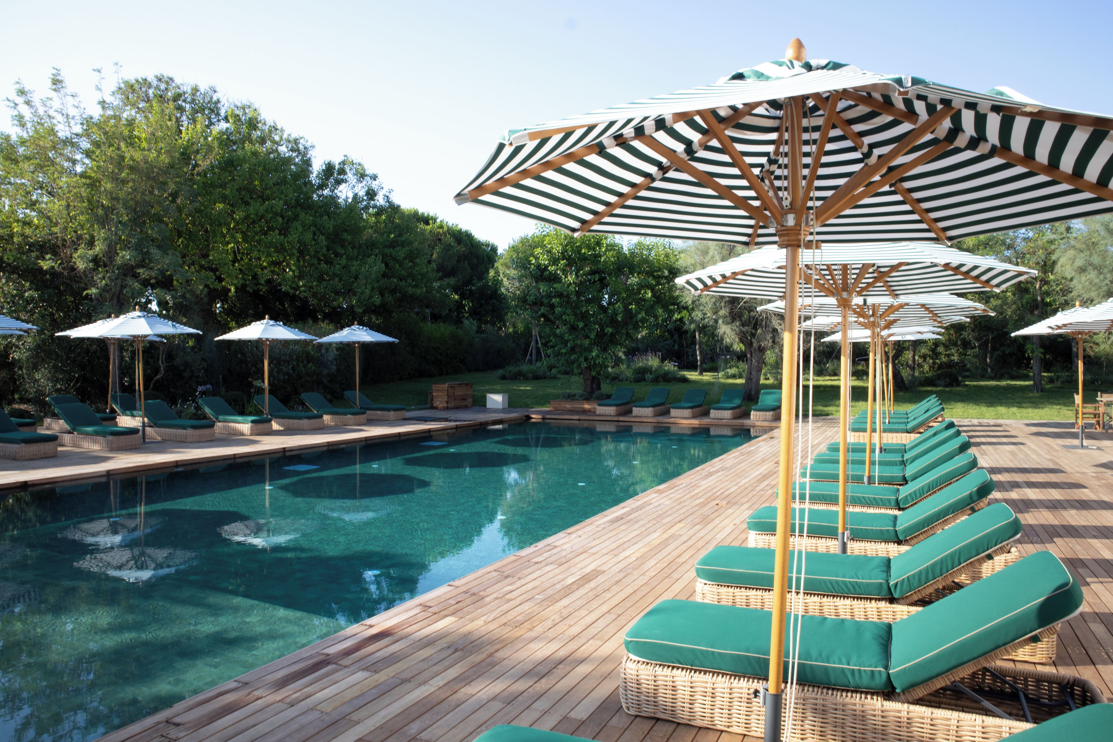 Seasonal outdoor pool, pool umbrellas, sun loungers