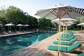Seasonal outdoor pool, pool umbrellas, pool loungers