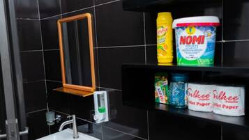 Shower, free toiletries, hair dryer, slippers