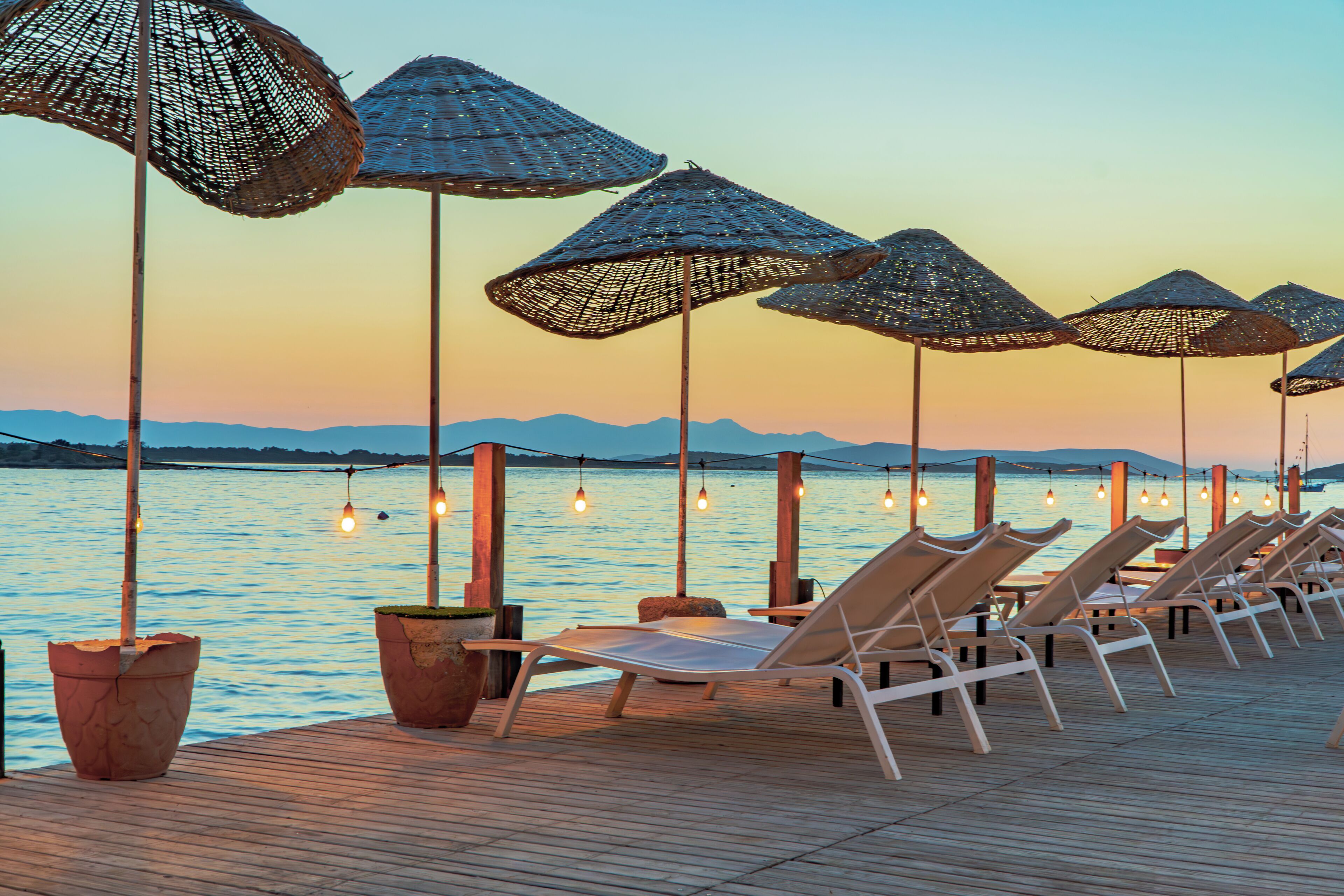 On the beach, sun-loungers, beach umbrellas, beach towels