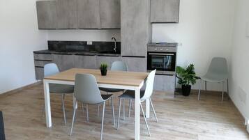 Apartamento, patio | Cocina privada