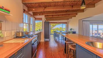 Family House, Lagoon View | Private kitchen | Full-size fridge, microwave, oven, stovetop