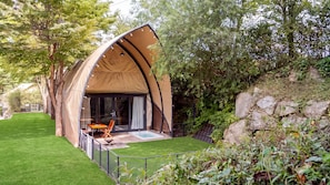 A tent-like structure with a glass door and a patio area with a table and chairs. - Gapyeong High Mong Glamping & Camping (Gapyeong)