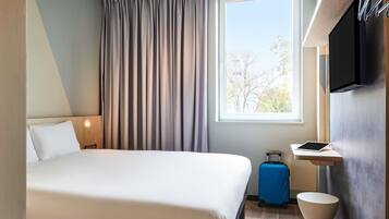 Een strijkplank/strijkijzer, gratis babybedden, gratis wifi, beddengoed