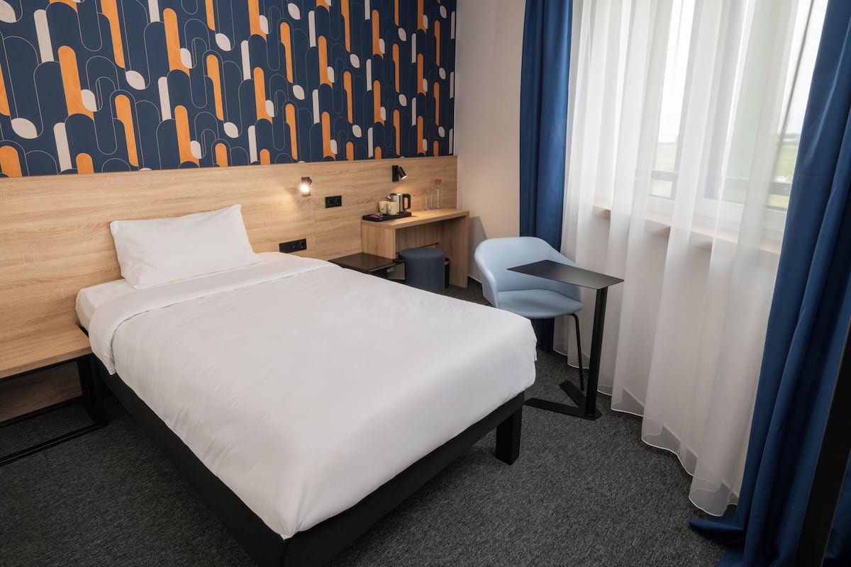 Ropa de cama hipoalergénica, minibar y cortinas blackout