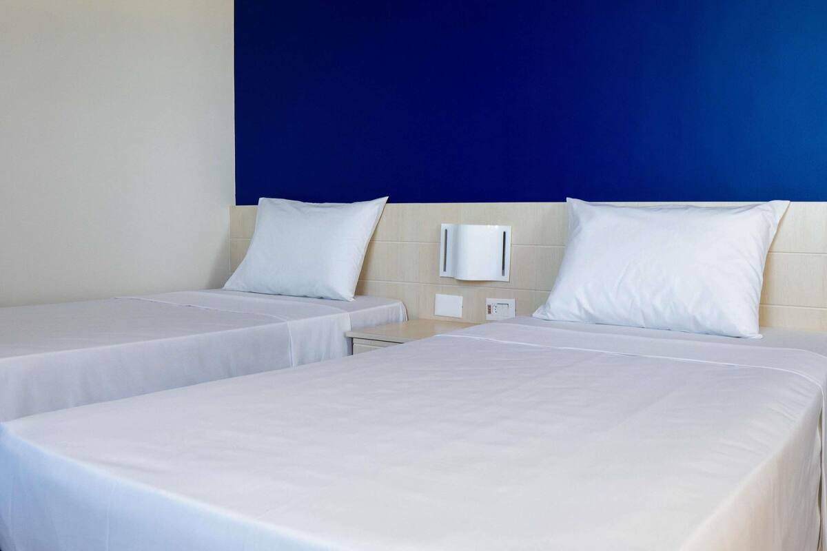 Standardzimmer, 2 Einzelbetten | Schreibtisch, laptopgeeigneter Arbeitsplatz, Verdunkelungsvorhänge