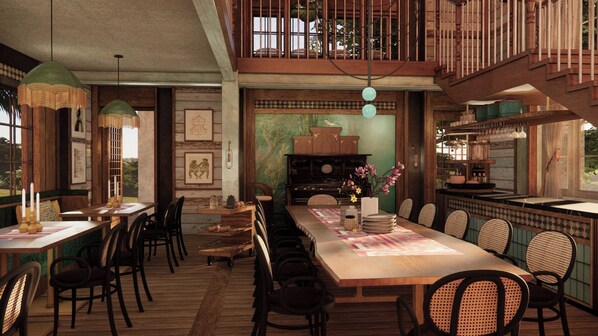 Un comedor amplio con una mesa larga, sillas de madera y una zona de bar con estantes.