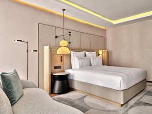 Premium bedding, down duvets, memory-foam beds, in-room safe