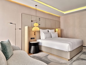 Premium bedding, down duvets, memory-foam beds, in-room safe
