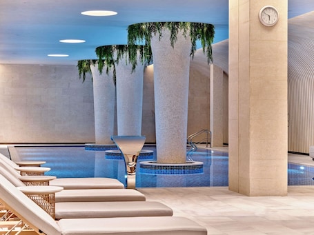 Indoor pool, open 9:00 AM to 9:00 PM, sun loungers