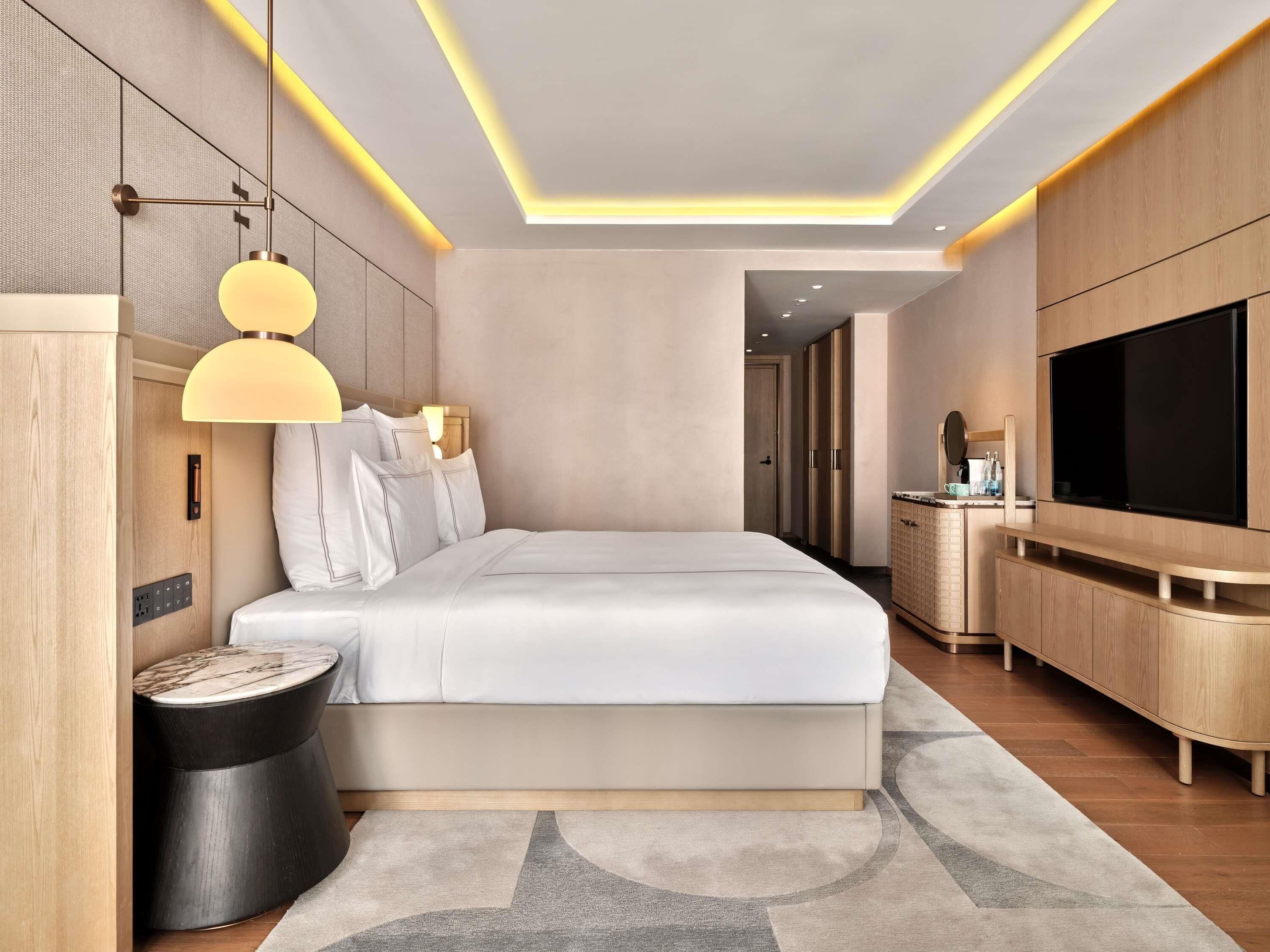 Premium bedding, down comforters, memory foam beds, in-room safe
