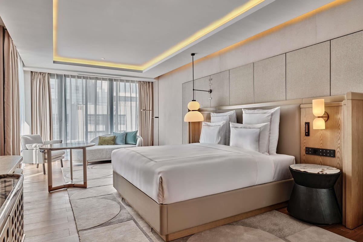 Premium bedding, down duvets, memory-foam beds, in-room safe