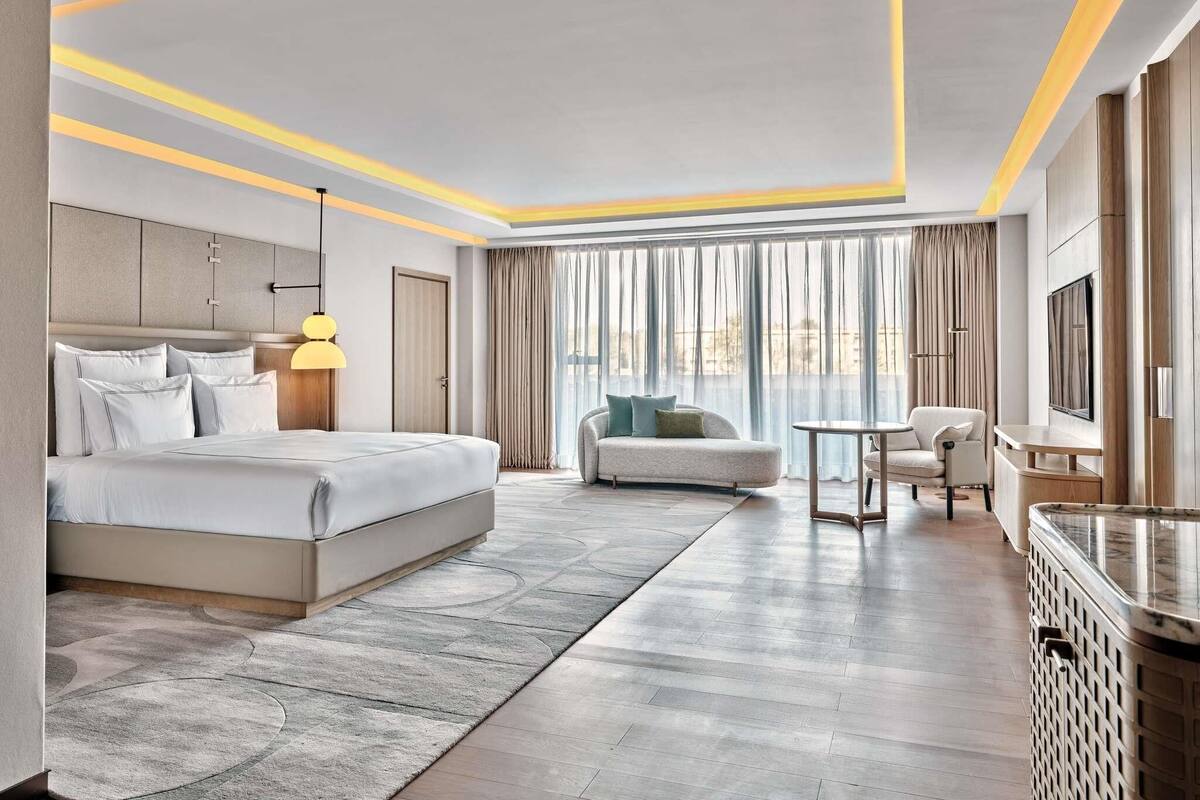 Premium bedding, down duvets, memory-foam beds, in-room safe