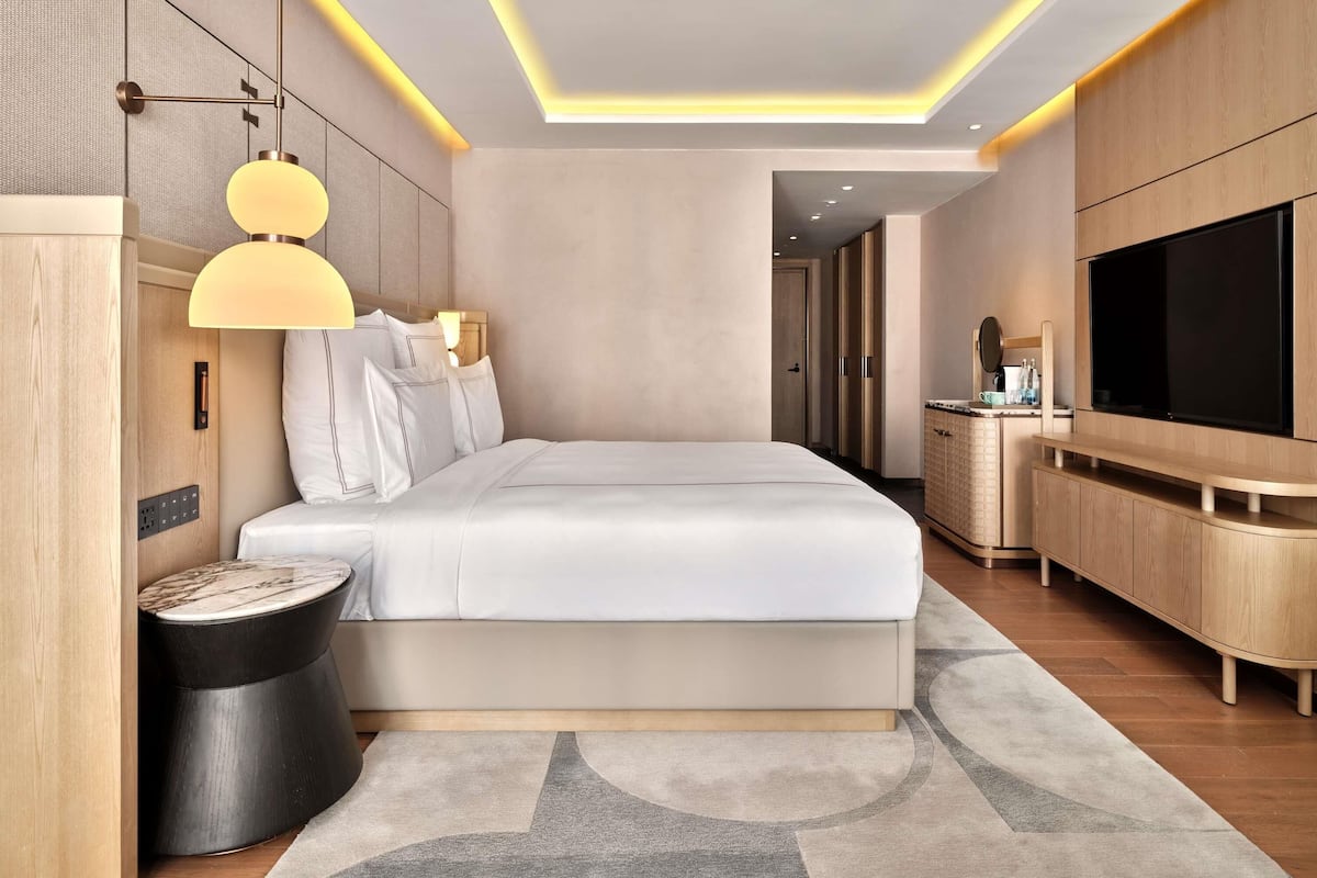 Premium bedding, down duvets, memory-foam beds, in-room safe