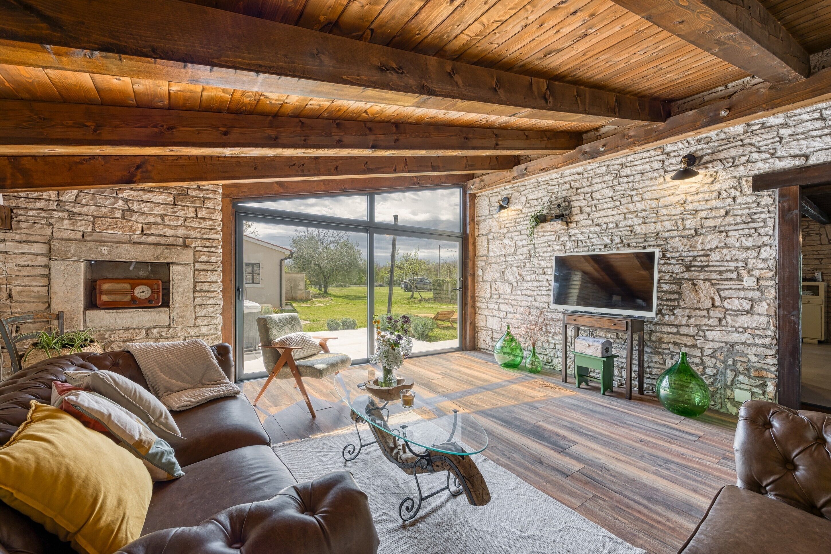 Family House, Multiple Bedrooms (Villa Capadinka with Whirlpool) | Living area | 21-inch flat-screen TV with digital channels, fireplace