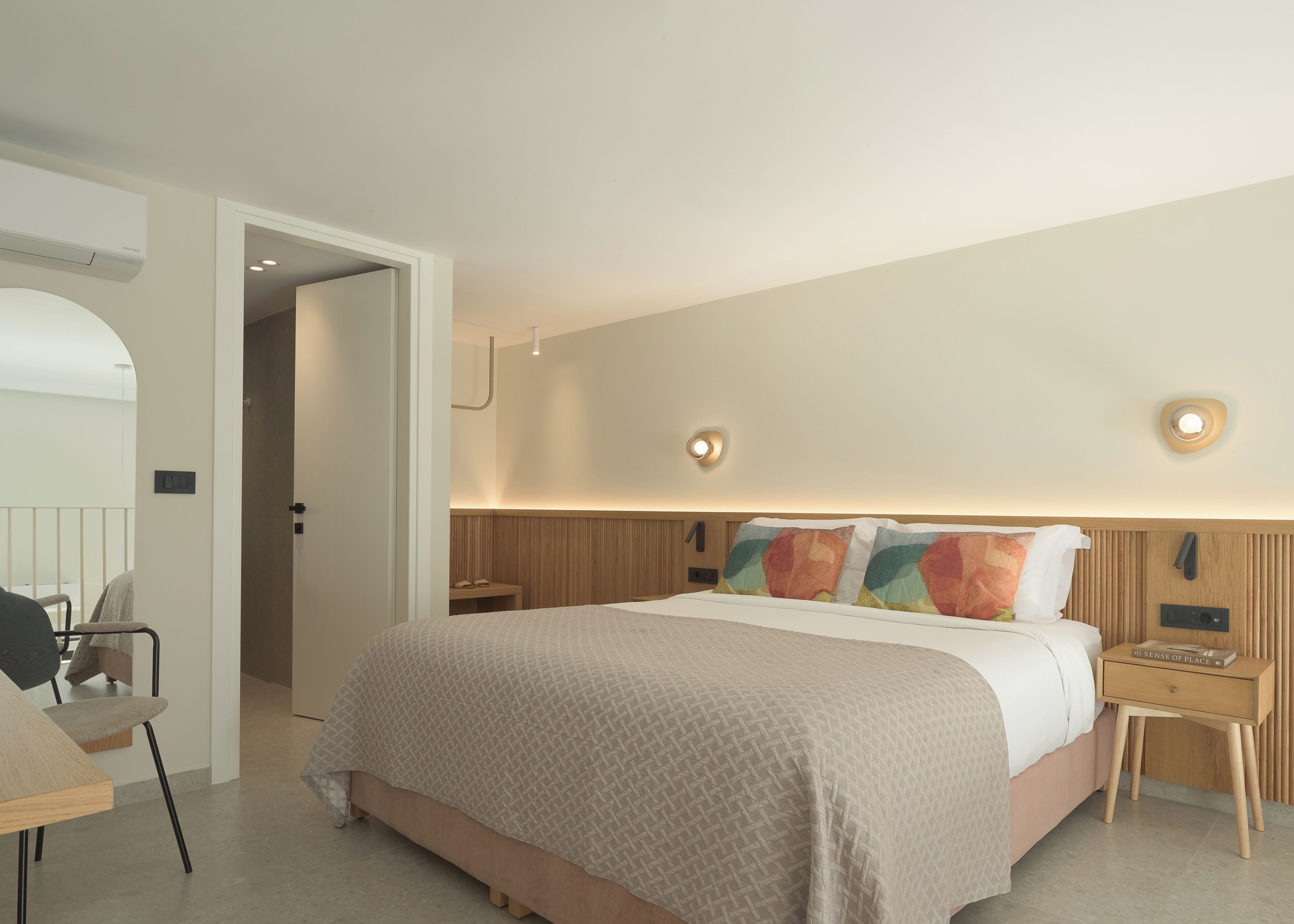 Loft Suite with Hot Tub 202 | Premium bedding, in-room safe, individually decorated