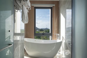 Executive Double Room, Beach View | Bathroom | Hair dryer, slippers, towels, soap