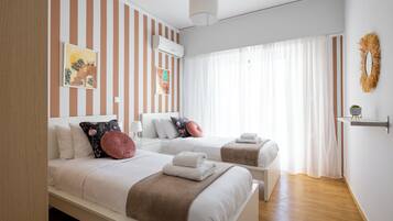 Apartemen, 2 kamar tidur, balkon, pemandangan kota | 2 kamar tidur, brankas, tirai kedap cahaya, dan setrika/meja setrika