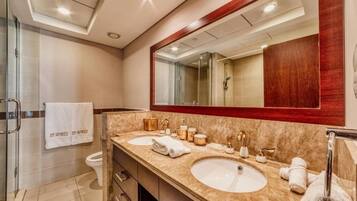 Apartment, Balcony, City View | Bathroom | Slippers, towels, soap, shampoo