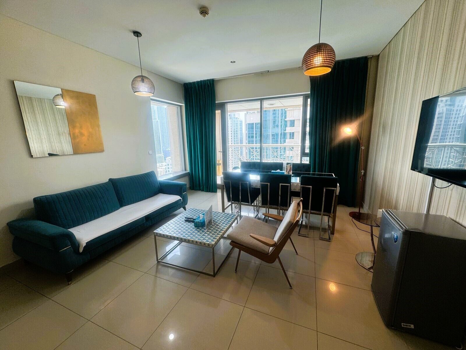 Apartment, Balcony, City View | Living area | Flat-screen TV