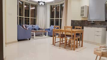 Panoramic Apartment, City View | Living area