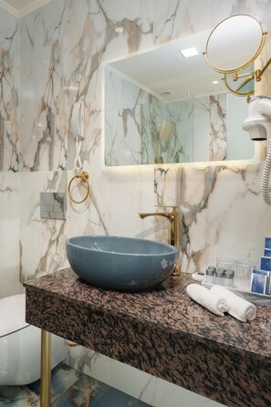 Free toiletries, hair dryer, slippers, towels