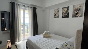 2 habitaciones, tabla de planchar con plancha, wifi y ropa de cama