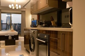 Iconic Studio with Burj Khalifa View | Private kitchen | Full-size fridge, microwave, oven, stovetop