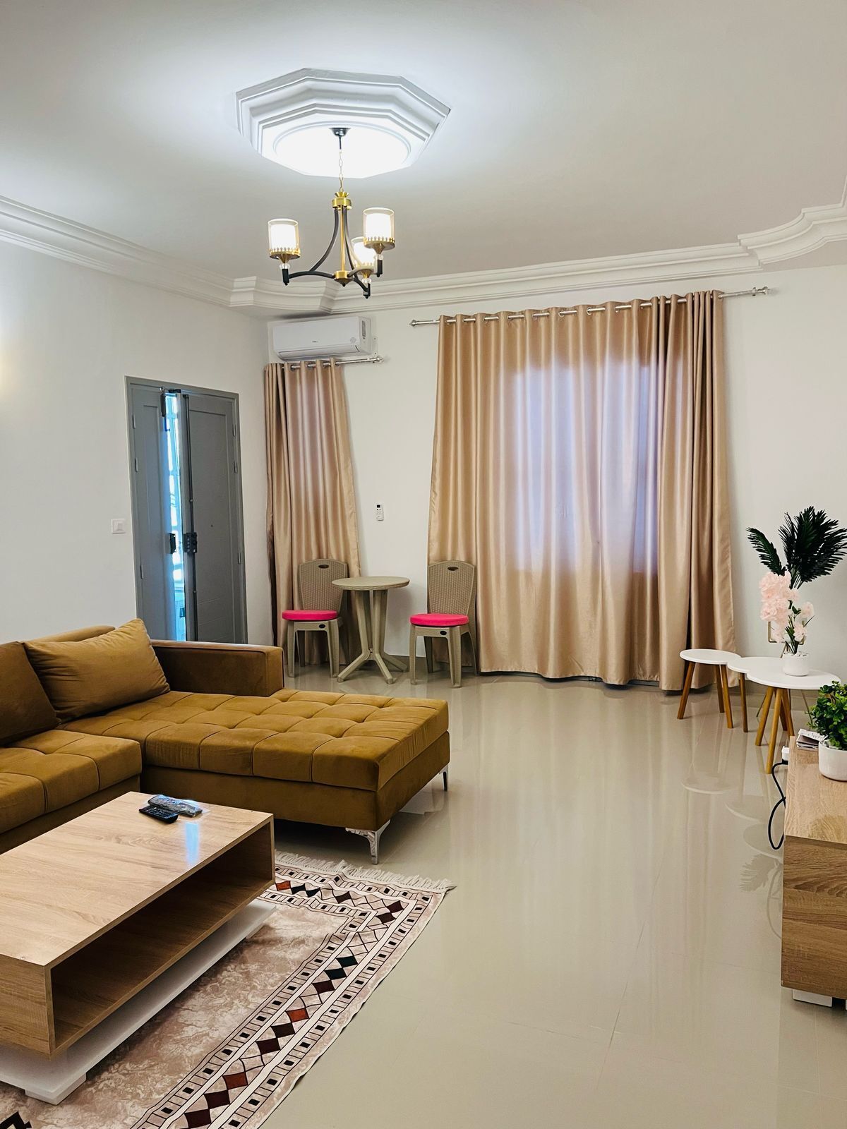 Family Apartment, Garden View | Living area | Flat-screen TV