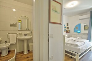 Family Apartment, Multiple Bedrooms (Garden & Surf Residenza By Max) | Bathroom | Shower, bidet, towels, soap - Garden & Surf Residenza By Max (Riva del Garda)