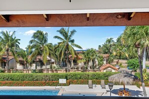 Condo, Garden View | 2 bedrooms, free WiFi - Stylish 2-Bedroom Beach Condo with Ocean-View Deck, Lush Pool Area & 2-Minute Walk to Flamingo Beach (Cabo Velas)