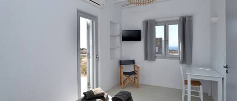 1 bedroom, desk, iron/ironing board, travel crib