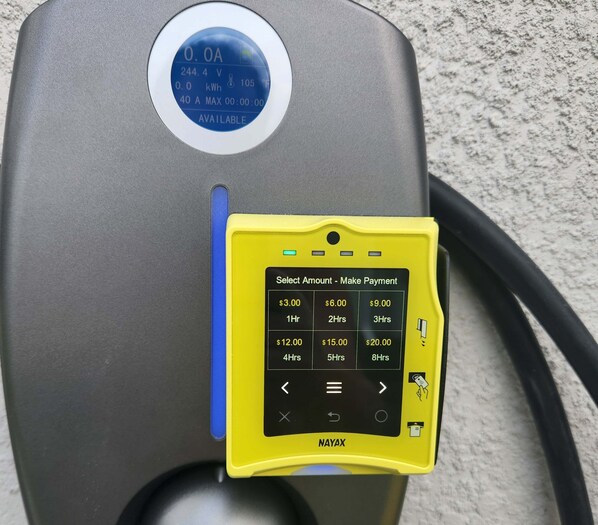 A portable generator with a digital display and a payment keypad. - New Poolside Home in South Gulf Cove! Beaches Boca Grande, Manasota, Siesta Key & Venice (Port Charlotte)