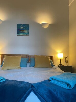 3 bedrooms, desk, iron/ironing board, travel cot