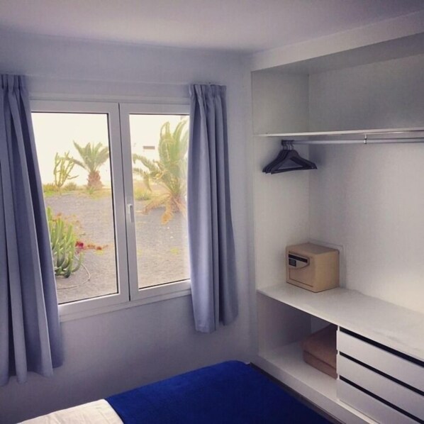 Superior Suite, Pool View | In-room safe, laptop workspace, blackout drapes, iron/ironing board