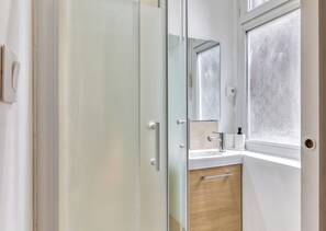 Shower, towels, soap, shampoo