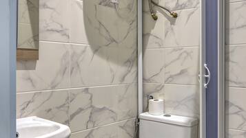 Shower, towels, soap, shampoo