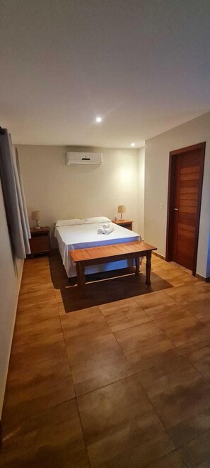 Phòng Suite Deluxe, 1 phòng ngủ, quang cảnh sân vườn | Tiện nghi tại phòng