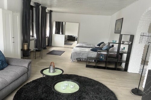 Spacious apartment in a central location directly on the river Niers and park