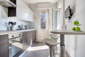 Appartement familial, vue sur la ville | Cuisine privée