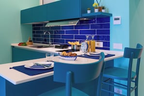 Fridge, microwave, dishwasher, coffee/tea maker
